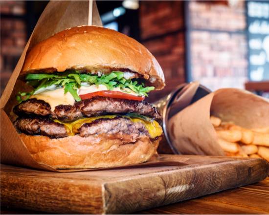 Order The California Burger food online from The Burger Trilogy store, New York on bringmethat.com