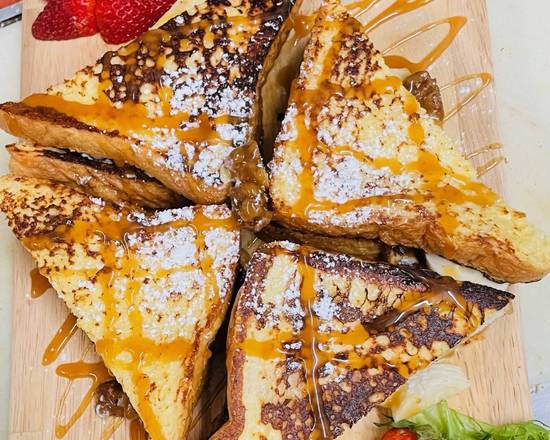 Order Stuffed banana Nuts French Toast food online from Cafe Papillon store, Miami on bringmethat.com