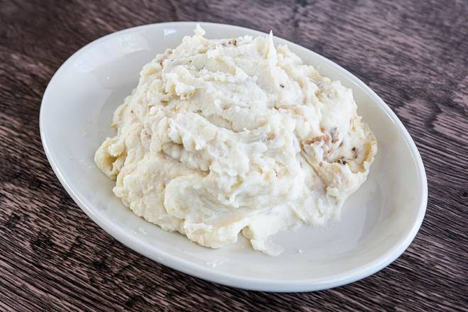 Order Mashed Potatoes food online from Wood Ranch BBQ & Grill store, Moorpark on bringmethat.com
