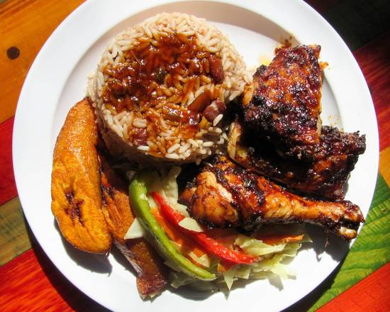 Order Jerk Chicken  food online from Cravin Jamaican Cuisine store, Ossining on bringmethat.com