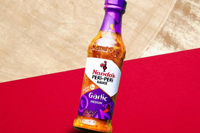 Order Bottle Sauce Garlic food online from Nando's Peri-Peri store, College Park on bringmethat.com