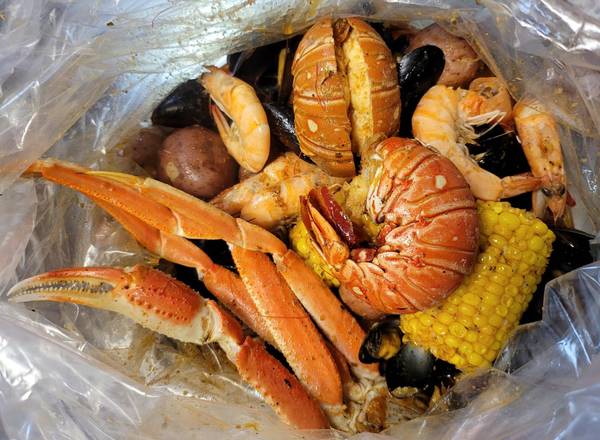 Order Snow Lobster Combo food online from Let Sea Bag N' Roll store, Artesia on bringmethat.com