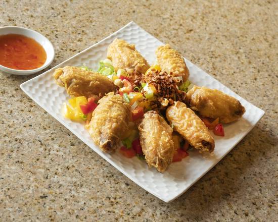 Order Cánh Gà Chiên Bơ (Butter glazed chicken wings.) food online from Mi La Cay store, Seattle on bringmethat.com