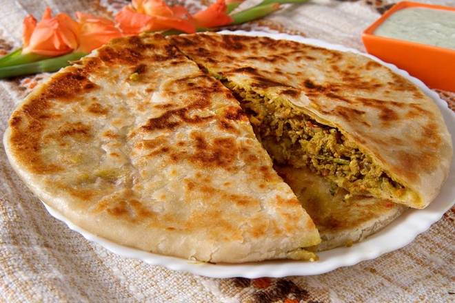 Order Keema Paratha (meat stuffing flatbread) food online from Hadi Restaurant store, New York on bringmethat.com