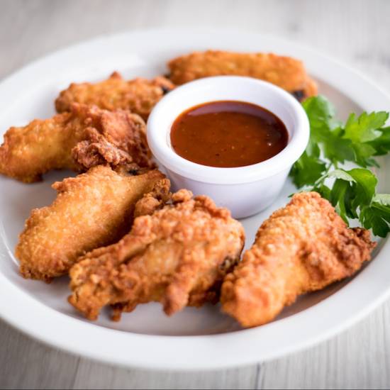 Order 20 Wings with 5 dipping sauces food online from The Great Room Cafe store, Redondo Beach on bringmethat.com