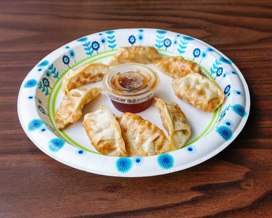 Order Fried Dumpling (8 pcs) food online from Kome Chinese And Japanese Restaurant store, Orlando on bringmethat.com