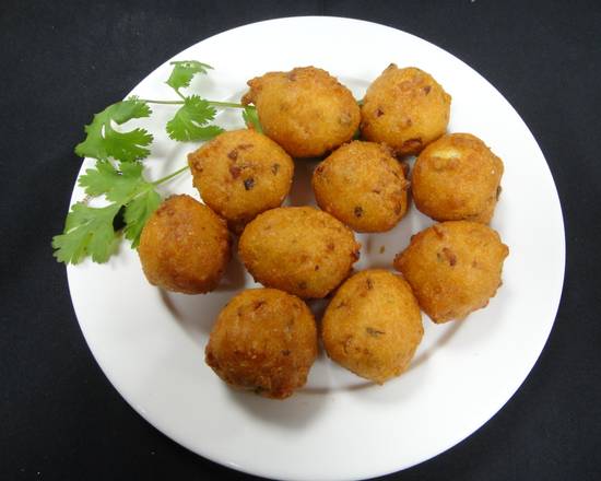 Order A1. Hush Puppies (10) food online from Captain King's Seafood City store, Memphis on bringmethat.com