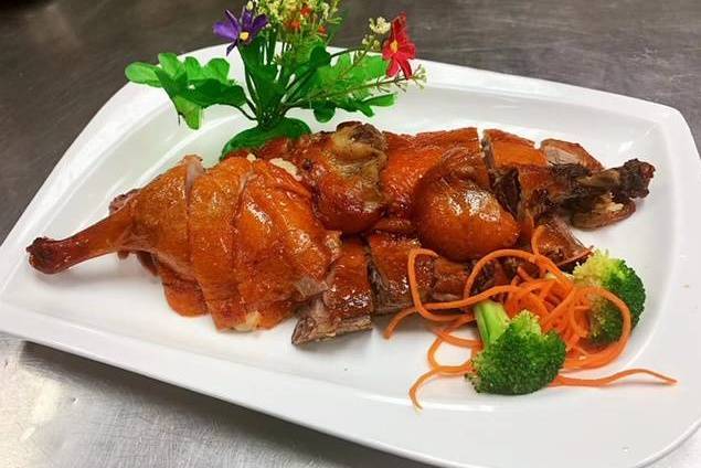 Order Charcoal Roasted Duck Bone In food online from Mulan Asian Bistro store, Memphis on bringmethat.com