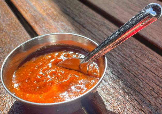 Order TAMARIND DATE CHUTNEY (GF, VEGAN) food online from Ghee Indian Kitchen store, Miami on bringmethat.com