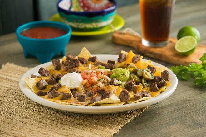 Order Fajita Nachos food online from Casa Ole store, Odessa on bringmethat.com