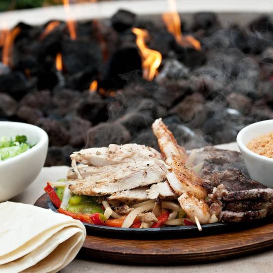 Order SIZZLING FAJITA SKILLET food online from 54th Street Grill and Bar store, Saint Joseph on bringmethat.com