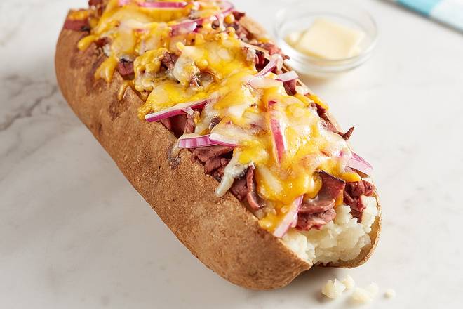 Order Black Angus Roast Beef Spud food online from Mcalister Deli store, Mcallen on bringmethat.com