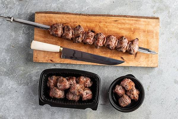 Order Filet Mignon Wrapped in Bacon food online from Texas De Brazil store, Farmington on bringmethat.com