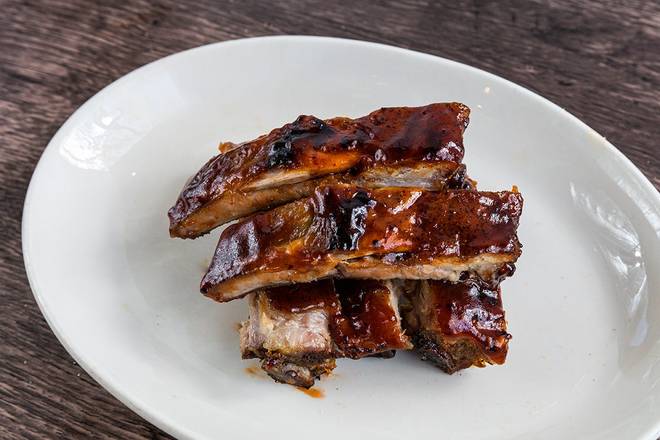 Order All-American Baby Back Ribs - 5 bones food online from Wood Ranch BBQ & Grill store, Moorpark on bringmethat.com