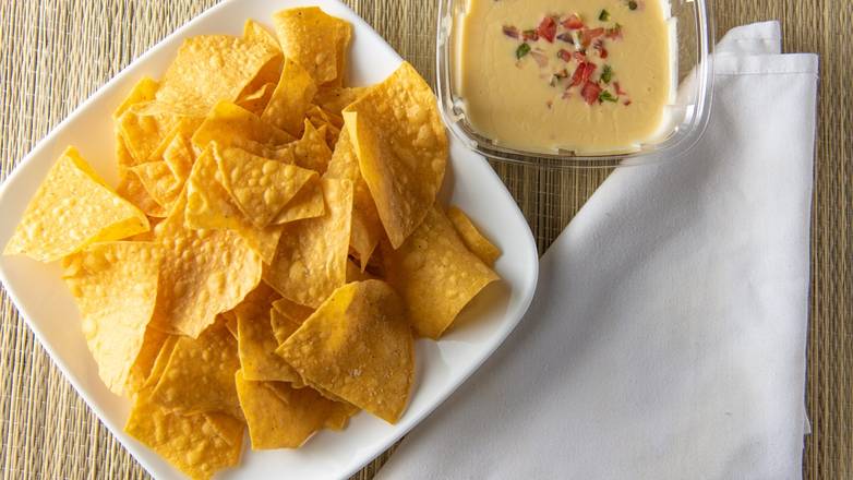 Order Queso 6oz food online from Zandra's Taqueria store, Haymarket on bringmethat.com