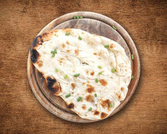 Order Naan Bread food online from United Kitchens Of India store, Schaumburg on bringmethat.com