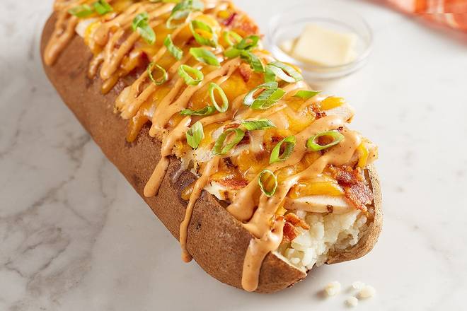Order Chipotle Chicken & Bacon Spud food online from Mcalister's Deli store, Tuscaloosa on bringmethat.com