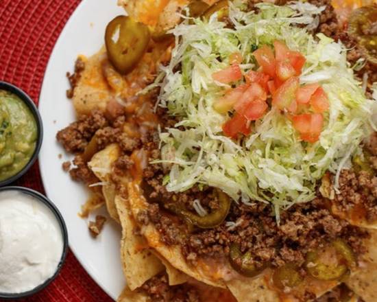 Order Nachos food online from El Sombrero Express store, Las Cruces on bringmethat.com