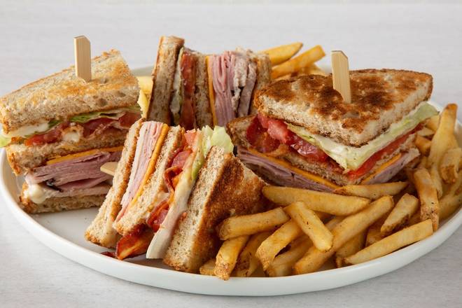 Order Double Decker Club food online from Village Inn store, Greeley on bringmethat.com