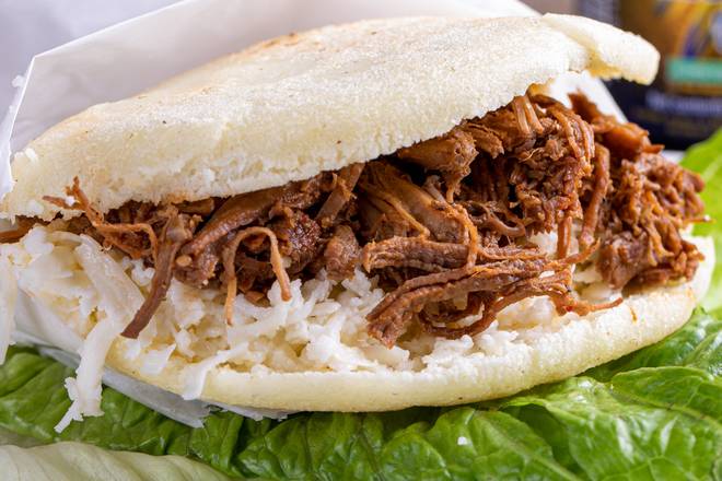 Order Pelua Arepa (Shredded Meat and Fresh White Cheese) food online from Don Pan International Bakery store, Miami on bringmethat.com