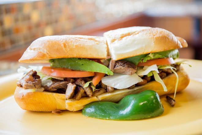 Order Torta food online from La Victoria Taqueria store, San Jose on bringmethat.com
