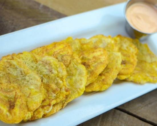 Order Fried Green Plantains Tostones food online from Chimiking Restaurant store, Orlando on bringmethat.com