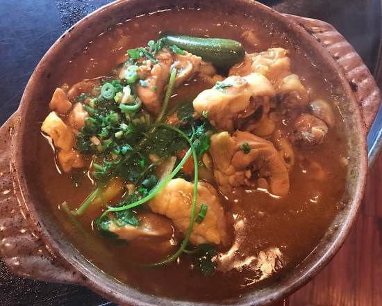 Order Hot Pot Chicken Curry with Potato food online from Rice Bistro store, Port Orange on bringmethat.com