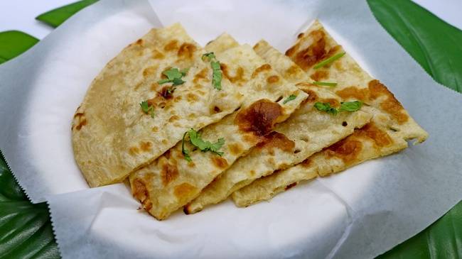 Order Garlic Naan food online from Ritha Indian Restaurant store, Foster City on bringmethat.com