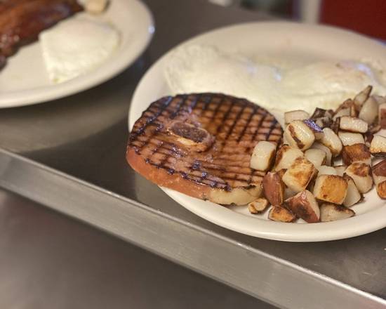 Order 6oz Bone-in Ham steak food online from Roo Roo Diner store, Largo on bringmethat.com
