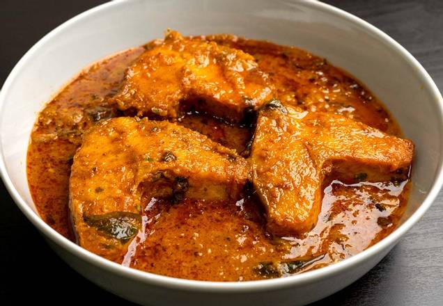 Order Masala Fish Curry food online from Desi Chops store, Chicago on bringmethat.com