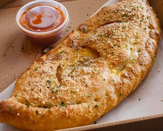 Order Traditional Calzone food online from Pizzeria Mozz store, Greenville on bringmethat.com
