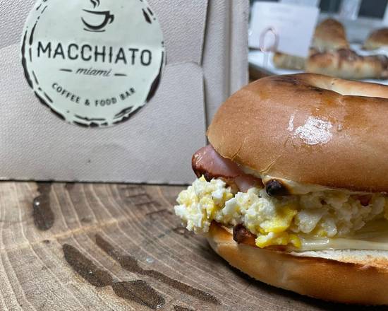 Order BAGEL EGG HAM & CHEESE food online from Macchiato Coffee & Food Bar store, Miami on bringmethat.com