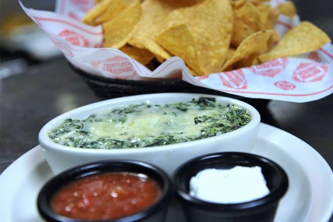 Order CHICAGO SPINACH & ARTICHOKE DIP food online from 54th Street Grill and Bar store, Saint Joseph on bringmethat.com