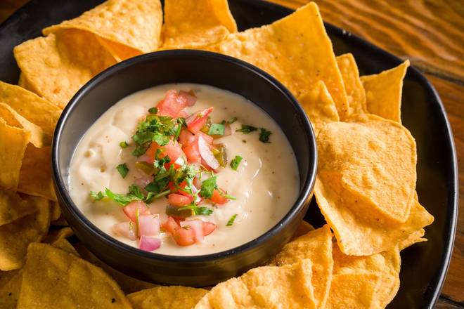Order Queso & Chips (Vegetarian) food online from The Rock Wood Fired Pizza store, Tacoma on bringmethat.com