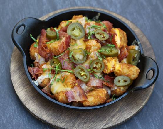 Order Loaded Tots food online from Max & Ermas Restaurants store, Monroeville on bringmethat.com