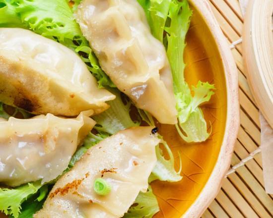 Order Steamed Pork Dumpling food online from Gangnam Korean Restaurant store, Jacksonville on bringmethat.com