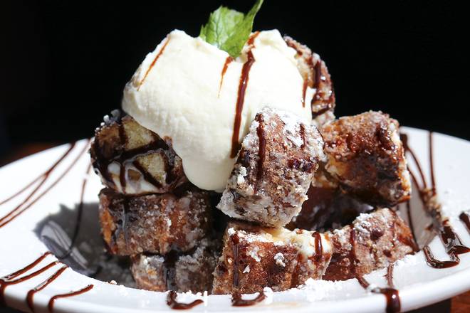 Order Cannoli Pretzel Stack food online from Boombozz Taphouse store, Louisville on bringmethat.com