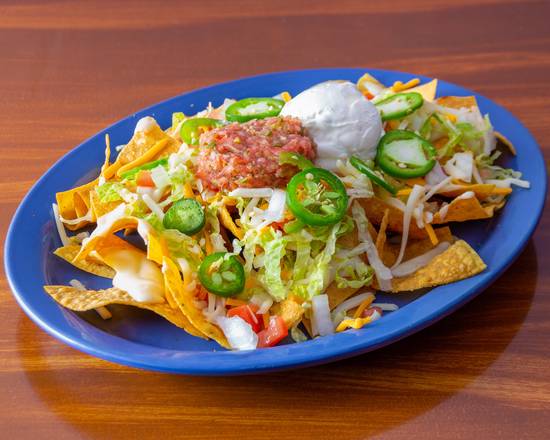 Order Nachos food online from Kiwi Pub & Grill store, Altamonte Springs on bringmethat.com