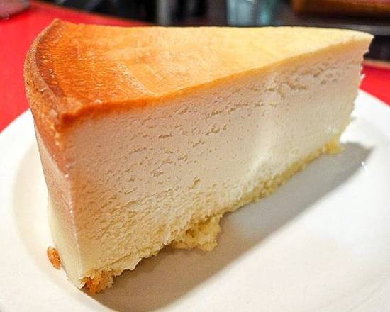 Order Junior's Famous New York Cheesecake food online from NYPD Pizza store, Orlando on bringmethat.com