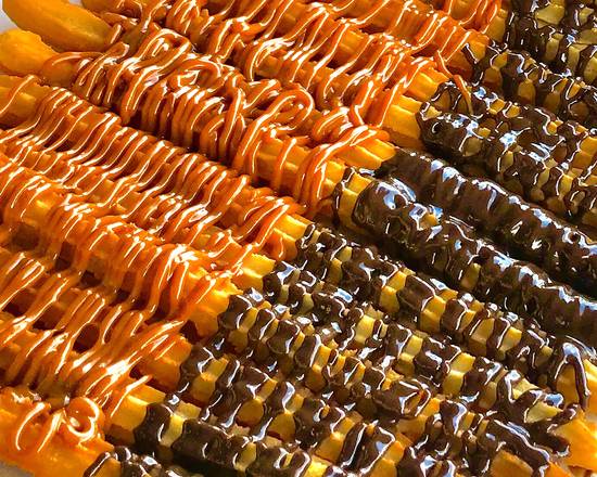 Order 14 Long Churros food online from Cuban Pizzeria store, Hialeah on bringmethat.com