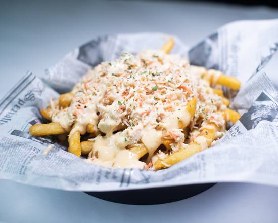 Order Crabmeat Fries food online from Hook & Reel Cajun Seafood store, lubbock on bringmethat.com