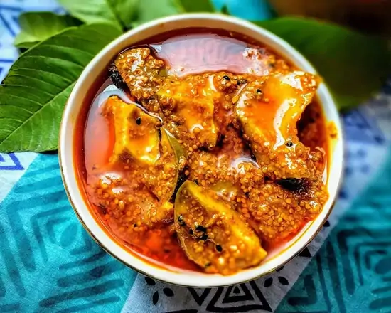 Order Mango achar (5.5oz) food online from Namaste Indian Cuisine store, Portland on bringmethat.com