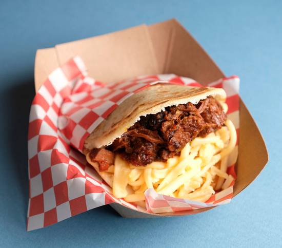 Order Asado Negro & Gouda Arepa food online from La Latina store, Miami on bringmethat.com