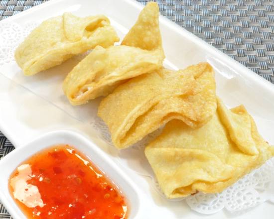 Order Crab Rangoon (4 pcs) food online from Sushi Taku store, Chicago on bringmethat.com