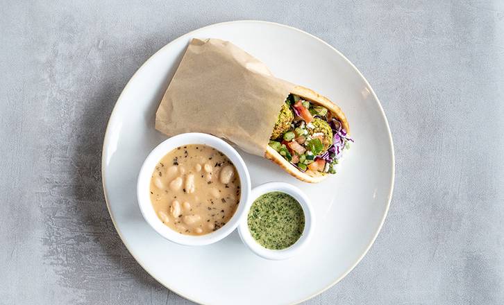 Order Baked Falafel Pita food online from Zoe's Kitchen store, Dallas on bringmethat.com