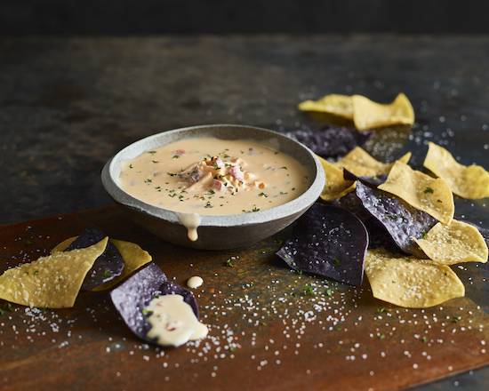 Order Cheddar Cheese Queso & Chips food online from Ruby Tuesday store, Las Cruces on bringmethat.com