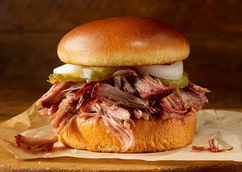 Order Pulled Pork Sandwich food online from Dickey Barbecue Pit store, Orlando on bringmethat.com