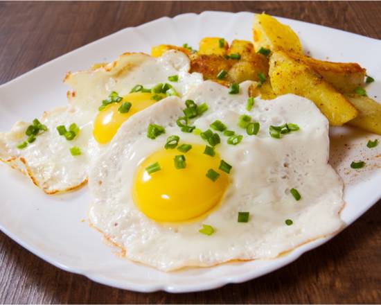 Order 2 Eggs Served with Home Fries and Toast food online from The Pancake Snob store, New York on bringmethat.com
