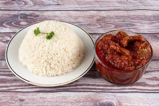 Order Red Stew food online from Wazobia Kitchen store, Houston on bringmethat.com