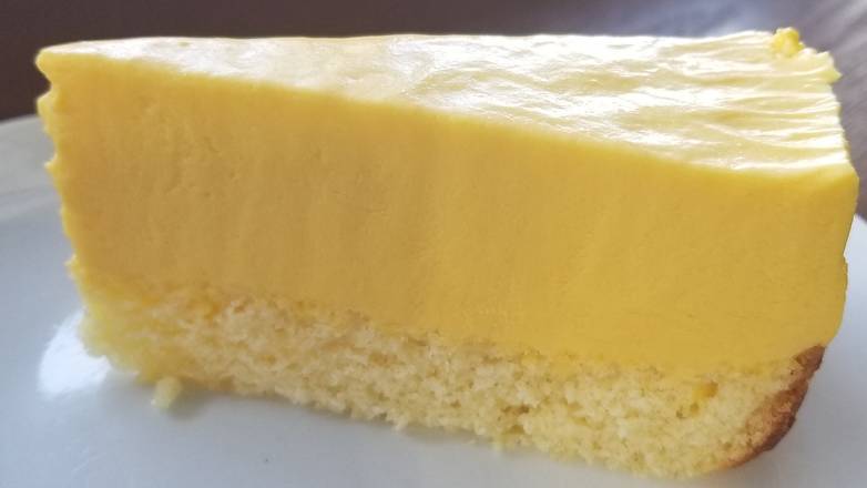 Order Mango Mousse Cake food online from Geo's Cuban store, Seattle on bringmethat.com